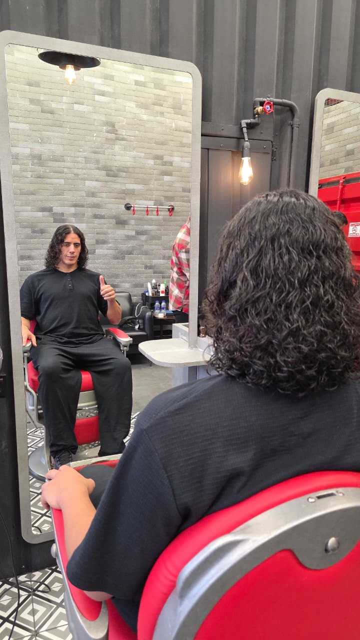Long hair client in the barber chair